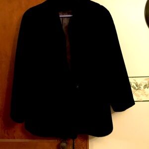 Faux fur coat Vintagege coat with satin lining. Clasp closure at neck
